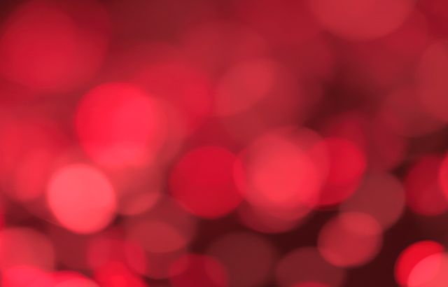 This image featuring red bokeh lights with a defocused, blurred effect is perfect for adding a festive, vibrant touch to various designs. It can be used as a background for holiday-themed projects, greeting cards, invitations, banners, and social media posts. The soft and warm color tones make it suitable for romantic settings, promotional materials, or artistic compositions that require a lively and energetic atmosphere.