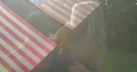 Loving Mother and Daughter with USA Flag Overlay in Garden