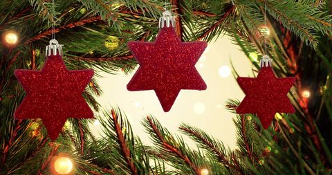 Festive Red Star Ornaments on Christmas Tree - Download Free Stock Images Pikwizard.com
