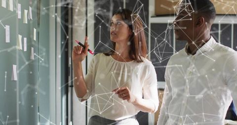 Colleagues Collaborating in Modern Office with Network Overlay