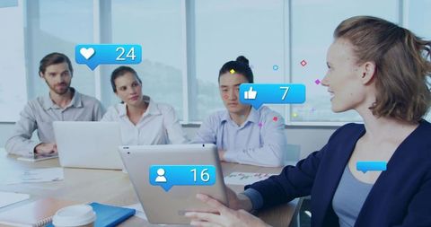 Presenting woman leading digital engagement with tablet in boardroom showing reactions