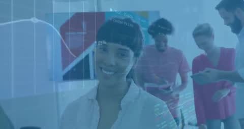 Smiling Team Lead with Colleagues Reviewing Data and Charts in Modern Office