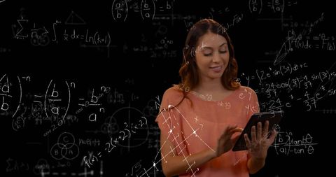 Businesswoman Using Tablet With Overlaid Math Equations - Download Free Stock Images Pikwizard.com