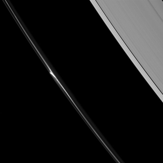 This image, taken by NASA Cassini spacecraft, shows A beautiful mini-jet appearing in the dynamic F ring of Saturn. Saturn A ring including the Keeler gap and just a hint of the Encke gap at the upper-right also appears.
