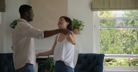 Happy Couple Embracing Amid Natural Light