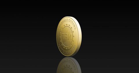 Golden NFT Cryptocurrency Coin Spinning on Black