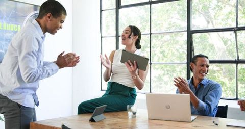 Successful Business Meeting with Cheerful Team