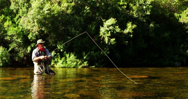 Man Fishing in River on Sunny Day - Download Free Stock Images Pikwizard.com