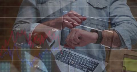 Businesswoman Interacting with Technology and Financial Charts