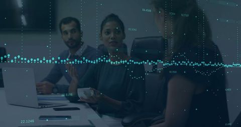 Business team analyzing data waves in modern office boardroom