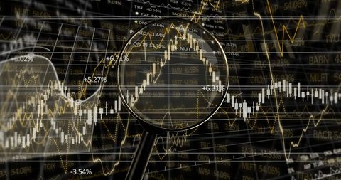 Examining Financial Data with Magnifying Glass Close-Up - Download Free Stock Images Pikwizard.com