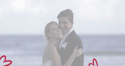 Caucasian Couple Embracing Romance Beachside Wedding - Download Free Stock Images Pikwizard.com