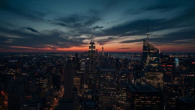 Empire state building dusk skyline view over new york city
