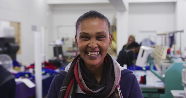 Smiling Woman Working in Modern Textile Factory - Download Free Stock Images Pikwizard.com