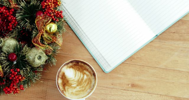 Festive Christmas Coffee with Decorative Wreath and Blank Notebook - Download Free Stock Images Pikwizard.com