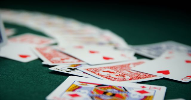 Scattered Playing Cards on Green Felt Gaming Table - Download Free Stock Images Pikwizard.com