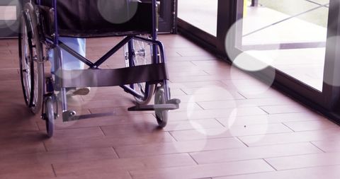 Silent Movement: Wheelchair in Bright Corridor - Download Free Stock Images Pikwizard.com