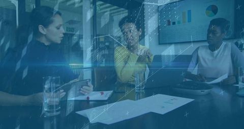 Professional Businesswomen Collaborating on Data Analysis