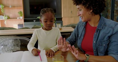 Mother Architects Daughter's Learning Journey at Dining Table