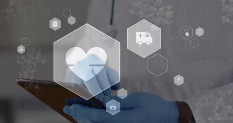 Doctor tapping tablet wearing blue gloves with hex medical interface for telemedicine