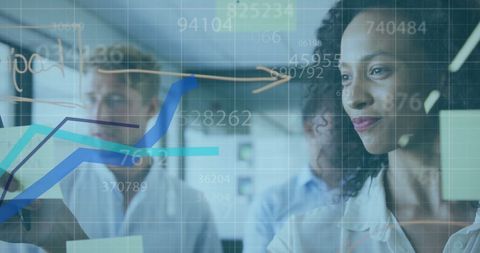 Diverse Business Team Analyzing Global Data in Office