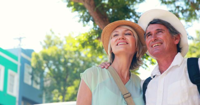 Smiling Senior Couple Enjoying a Sunny Day in the Park - Download Free Stock Images Pikwizard.com