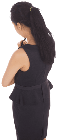 the image depicts an asian businesswoman in professional attire, holding a pen thoughtfully, her back turned to the viewer. her pose suggests deliberation, strategy, and decision-making. this transparent background makes it perfect for graphic design or business presentations, allowing seamless integration into various digital or print layouts that focus on business concepts or corporate growth.