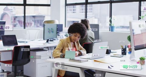 African American Businesswoman Engaging with Social Media in Modern Office - Download Free Stock Images Pikwizard.com