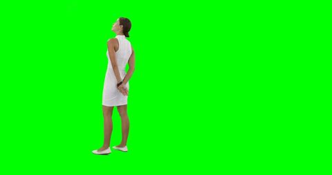 Young Woman in Profile with Blank Green Screen Background