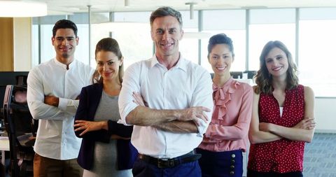 Diverse Business Team in Modern Office Environment Looking Confident