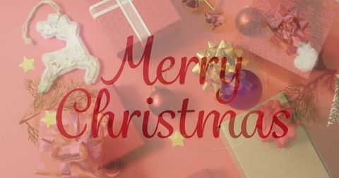 Merry Christmas Text Over Christmas Gifts and Ornaments