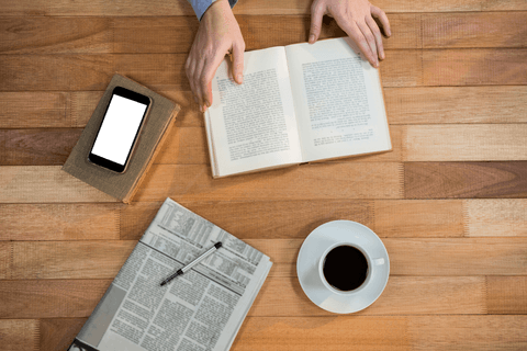 Transparent Workspace with Book, Coffee, and Mobile Phone - Download Free Stock Videos Pikwizard.com