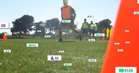 Athlete lunging on pitch displaying dynamic digital performance metrics