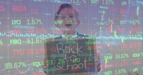 Schoolboy with Chalkboard Amid Stock Market Data Display