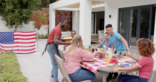 Group Enjoying BBQ Picnic in Backyard with American Flag - Download Free Stock Images Pikwizard.com