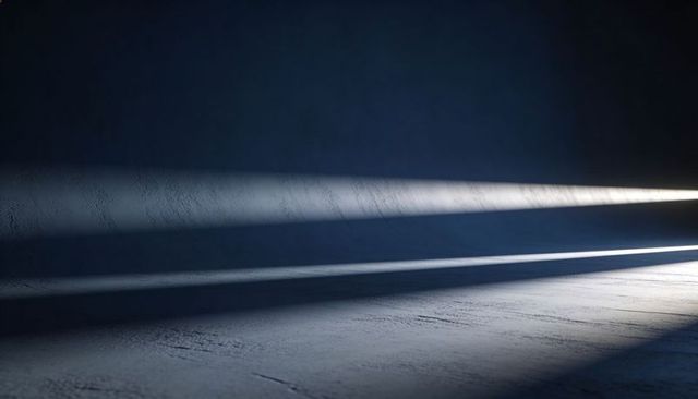 Three light beams casting long shadows across textured concrete floor and wall