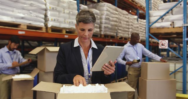 Warehouse Manager Supervising Inventory with Digital Tablet - Download Free Stock Images Pikwizard.com