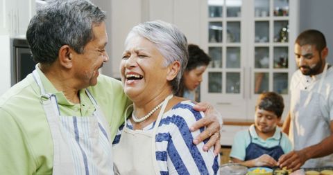 Joyful Moments Cooking Together Older Couple Family Kitchen Bonding - Download Free Stock Images Pikwizard.com