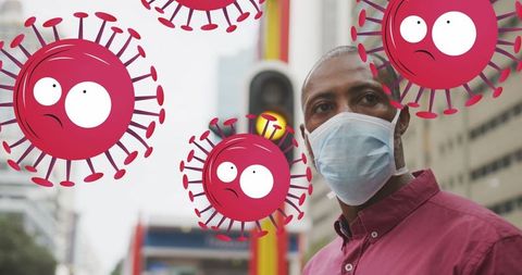 Man wearing face mask surrounded by depicted covid-19 cells in urban area