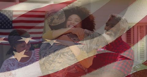 Soldier homecoming with family and american flag overlay