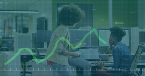 Business Professionals Analyzing Data with Graph Overlay in Modern Office