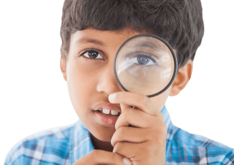 Curious child looking through transparent magnifying glass