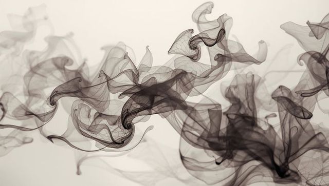 Sinuous Ink Smoke Swirls Creating Translucent Ribbons, Fluid Vortices and Elegant Motion