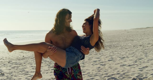 Happy Couple Embracing at Beach During Sunset - Download Free Stock Images Pikwizard.com