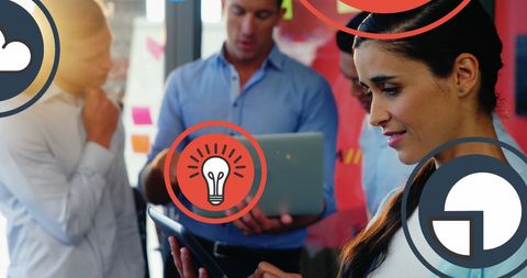 Businesswoman Using Tablet with Digital Innovation Icons in Office - Download Free Stock Images Pikwizard.com