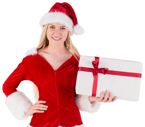 Smiling Festive Woman in Santa Hat Holding Christmas Gift Transparent Background