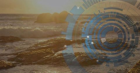 Futuristic digital overlay on rugged ocean shoreline at sunset