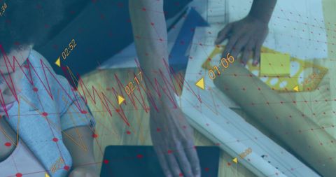 Businesswoman Analyzing Data on Tablet with Graph Overlay