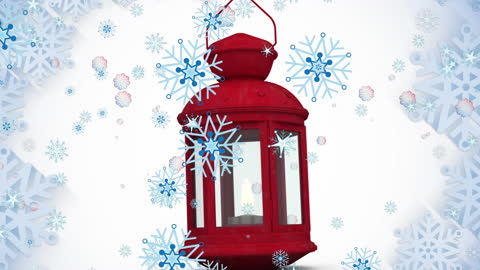 Festive Red Lantern Surrounded by Falling Snowflakes