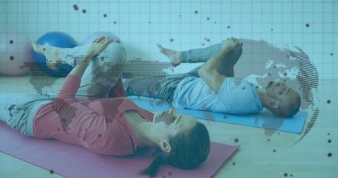 Partners Doing Knee-to-Chest Stretches with Stability Balls - Download Free Stock Images Pikwizard.com